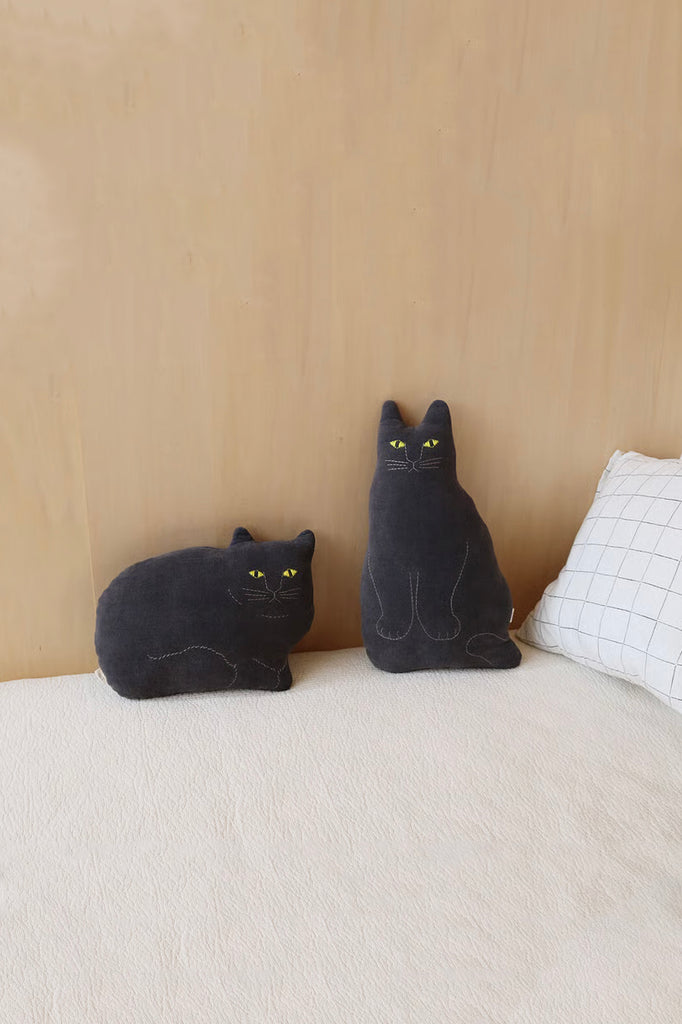Black Cat Cushion, A – Moth