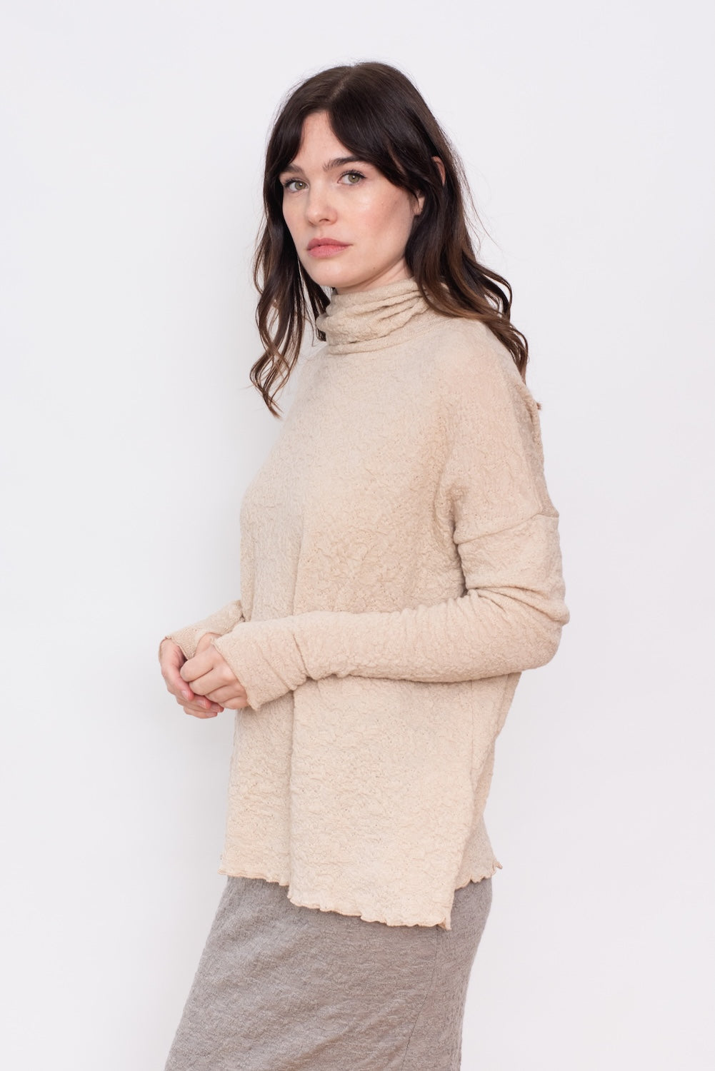 Merino Bubble Wool Roll Neck Sweater in Almond