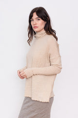 Merino Bubble Wool Roll Neck Sweater in Almond